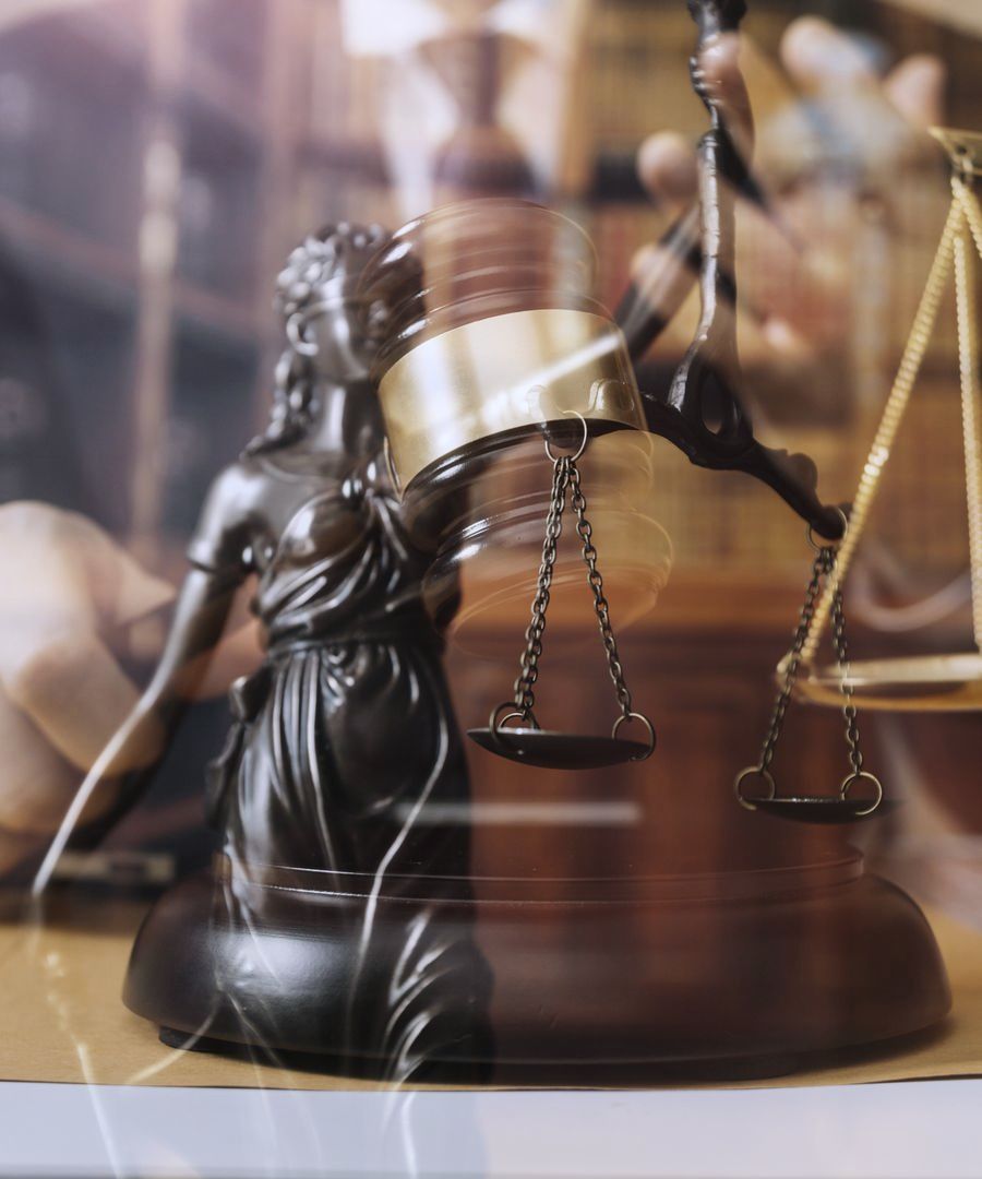 Scales of justice and gavel in a law office